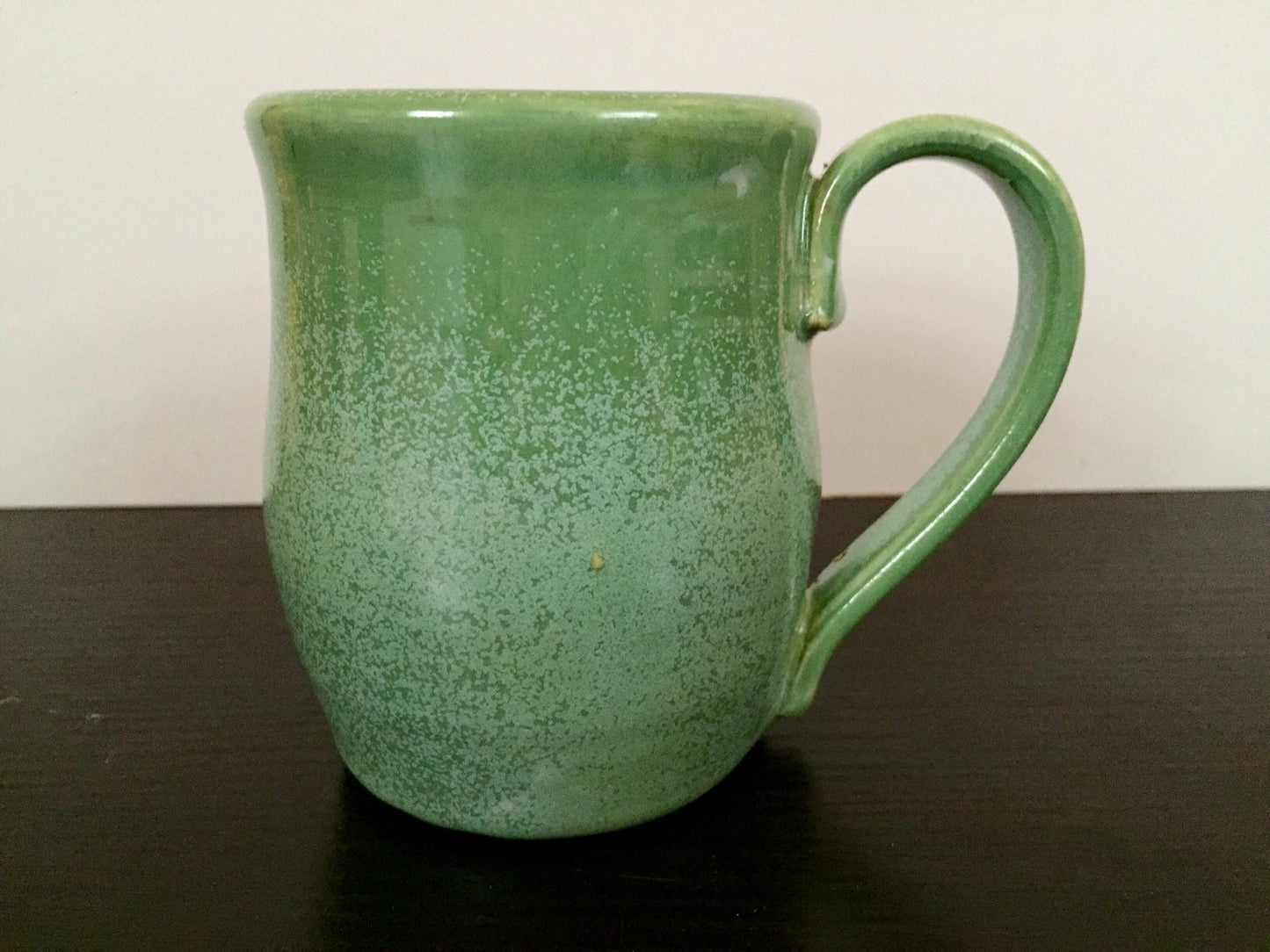 Harry potter Ceramic mug with "9 and 3/4" platform symbol in green a s black